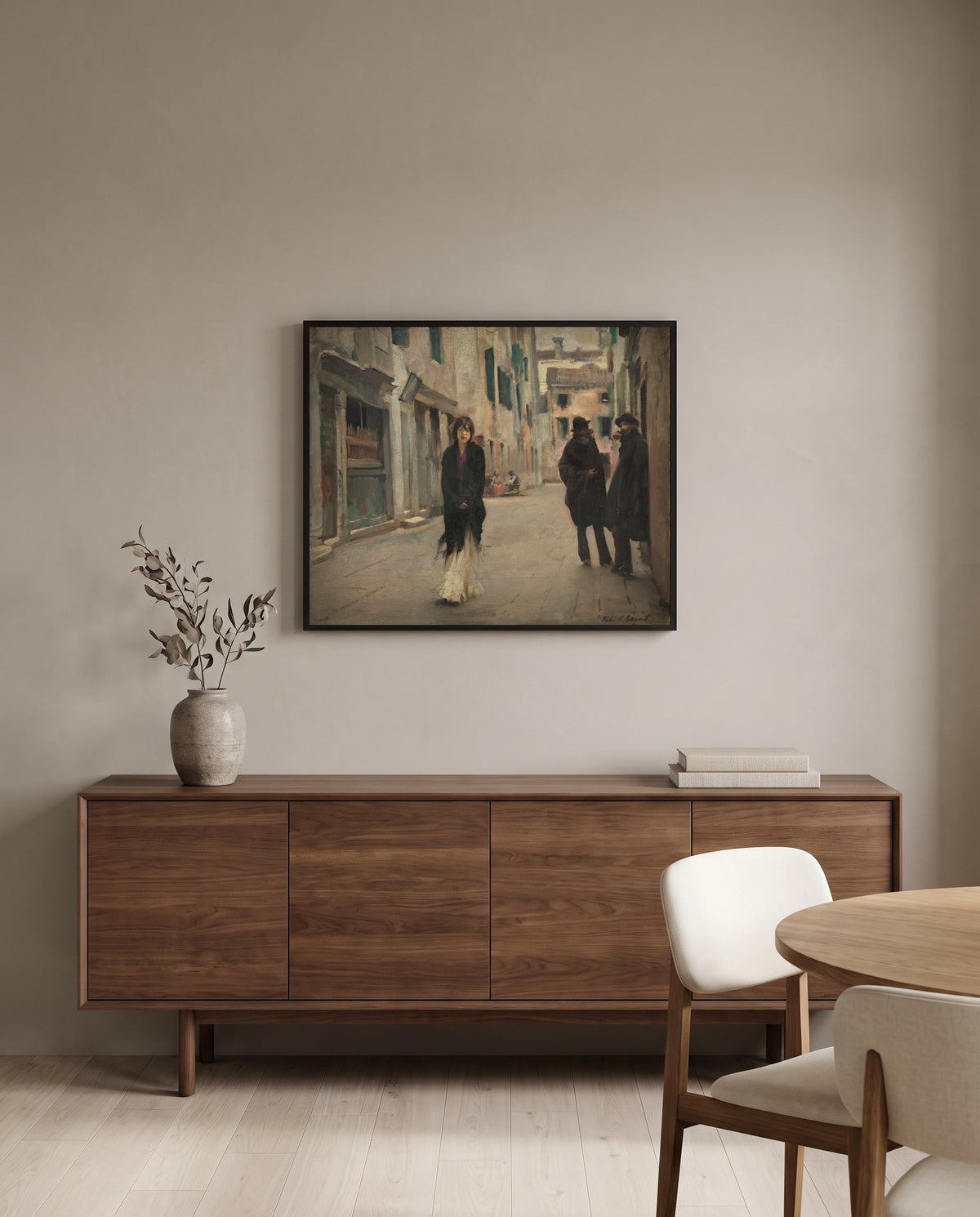 Street in Venice by John Singer Sargent in a black frame above a walnut sideboard in a dining room