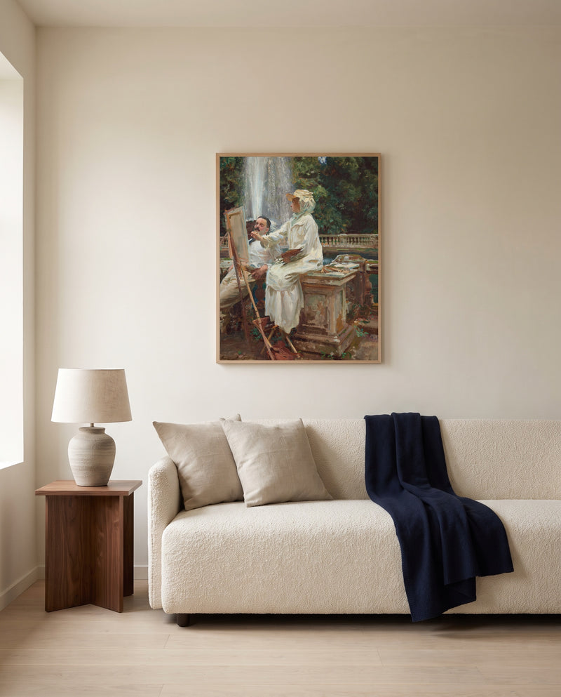 The Fountain, Villa Torlonia by John Singer Sargent framed in natural oak above a cream sofa in a warm living room