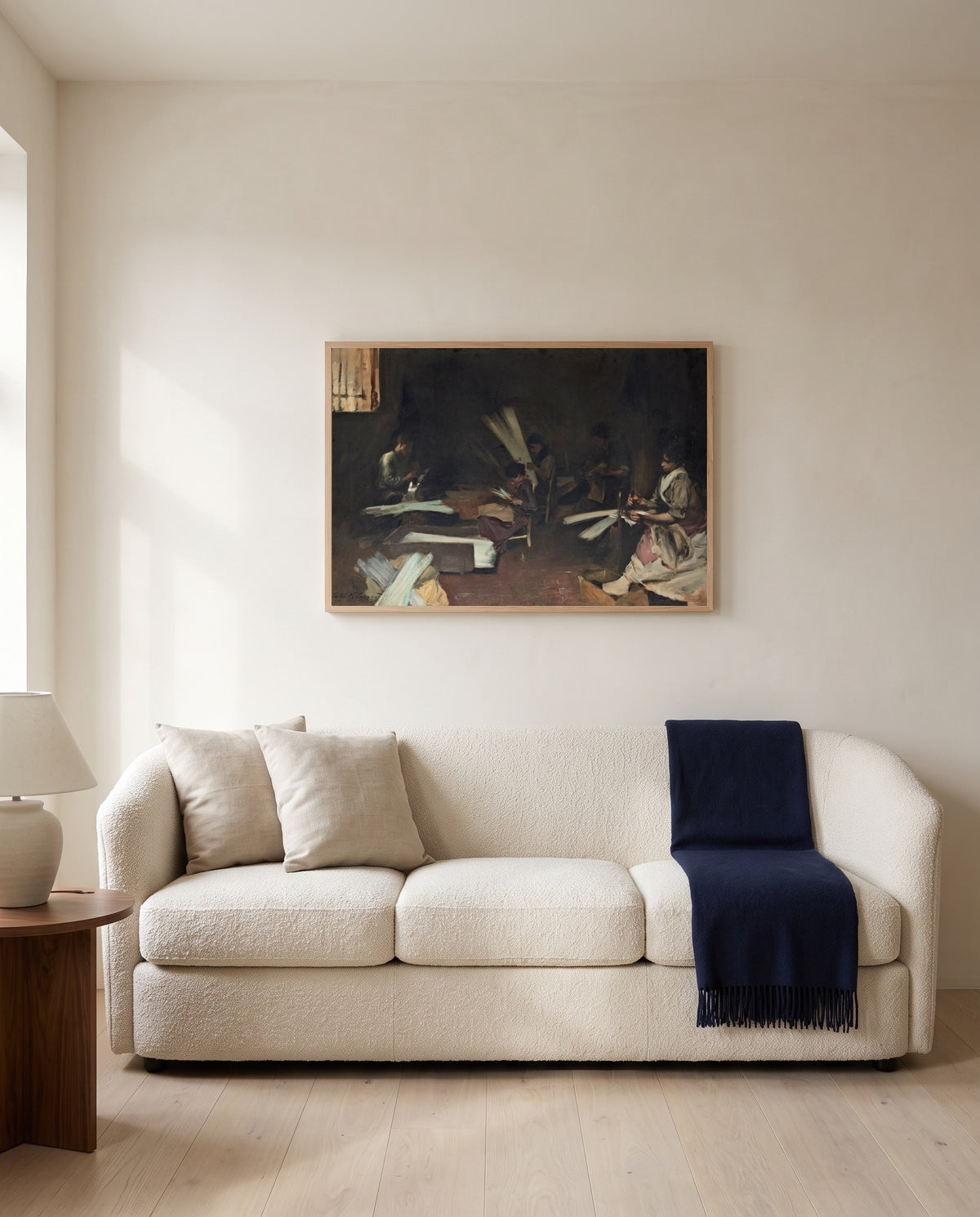 Venetian Glass Workers by John Singer Sargent framed in natural oak above a cream sofa in a warm living room