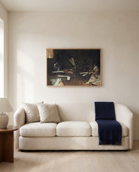 Venetian Glass Workers by John Singer Sargent framed in natural oak above a cream sofa in a warm living room