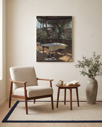 Wineglasses by John Singer Sargent as a stretched canvas above a linen lounge chair in a reading corner