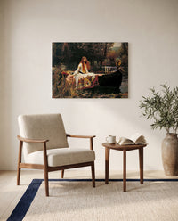 The Lady of Shalott by John William Waterhouse as a stretched canvas above a linen lounge chair in a reading corner