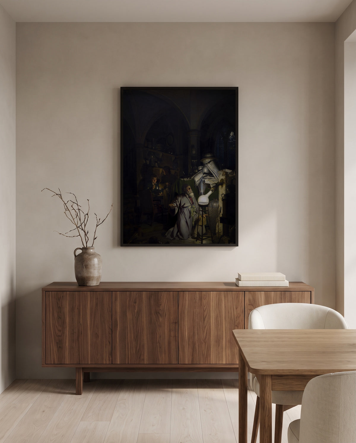 The Alchemist by Joseph Wright of Derby in a black frame above a walnut sideboard in a dining room