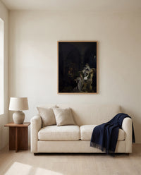 The Alchemist by Joseph Wright of Derby framed in natural oak above a cream sofa in a warm living room
