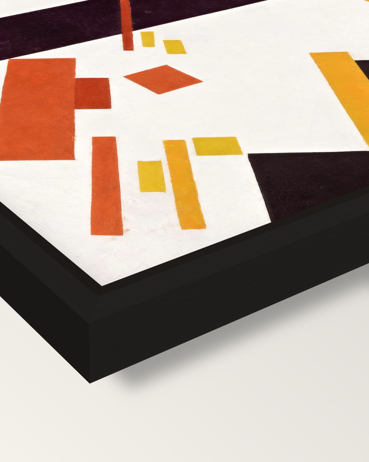 Suprematist Composition by Malevich framed canvas, corner close-up: a black floating frame with a shadow gap round the canvas