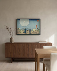 New Yoshiwara by Utagawa Kuniyoshi in a black frame above a walnut sideboard in a dining room