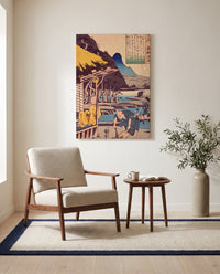 The Poet’s Cabin by Utagawa Kuniyoshi as a stretched canvas above a linen lounge chair in a reading corner