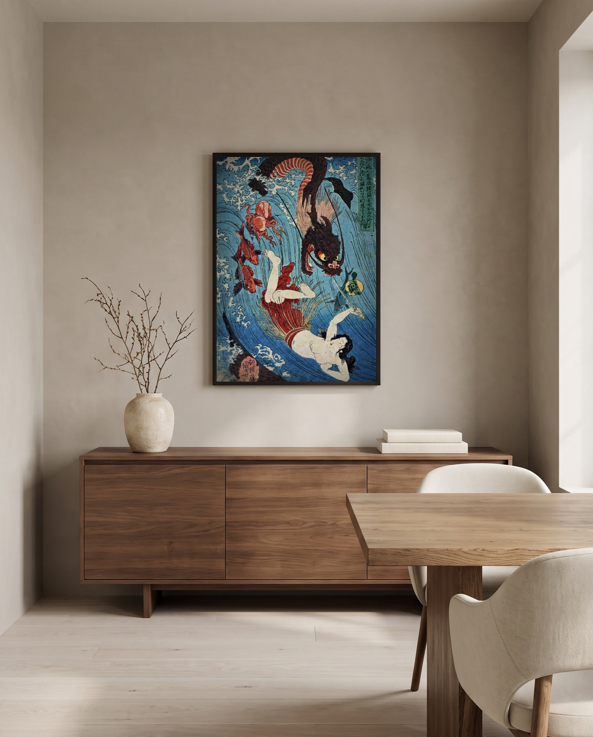 Tamatori and the Dragon King by Utagawa Kuniyoshi in a black frame above a walnut sideboard in a dining room