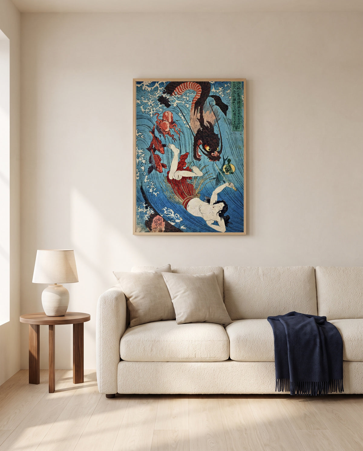 Tamatori and the Dragon King by Utagawa Kuniyoshi framed in natural oak above a cream sofa in a warm living room