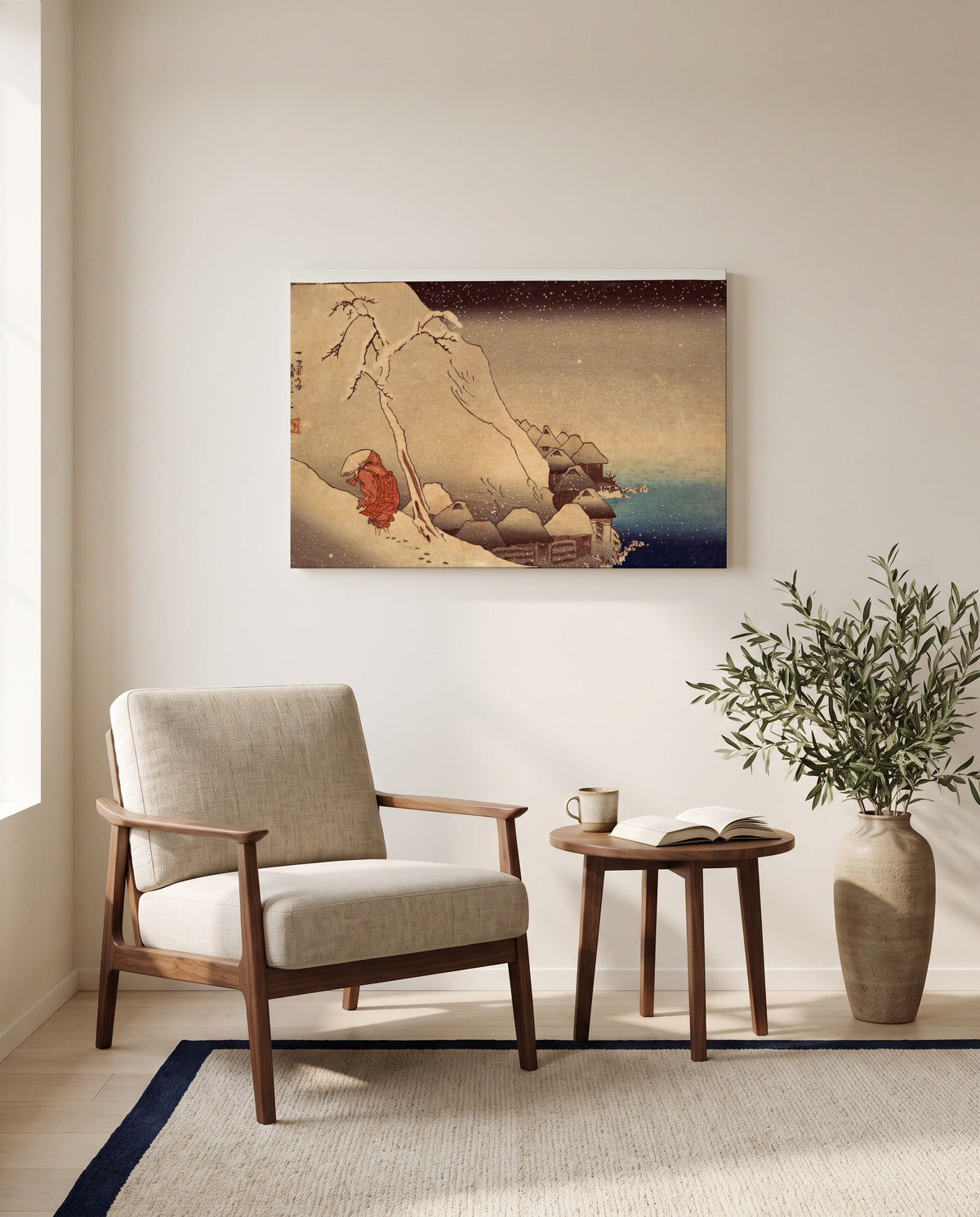 Travelling in a Snowstorm by Utagawa Kuniyoshi as a stretched canvas above a linen lounge chair in a reading corner
