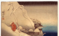 Travelling in a Snowstorm by Utagawa Kuniyoshi: a traveller climbing a snowy hill above snow-covered houses and dark sea