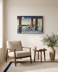 Tsukuda Island by Utagawa Kuniyoshi as a stretched canvas above a linen lounge chair in a reading corner