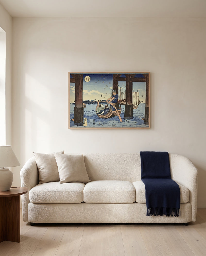 Tsukuda Island by Utagawa Kuniyoshi framed in natural oak above a cream sofa in a warm living room