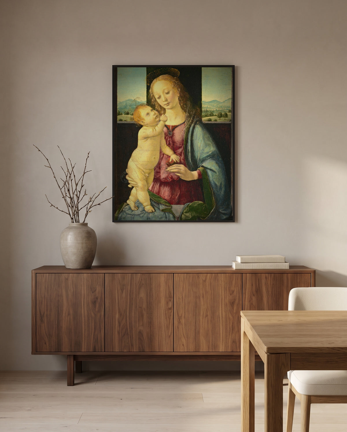 Madonna with a Pomegranate by Lorenzo di Credi in a black frame above a walnut sideboard in a dining room
