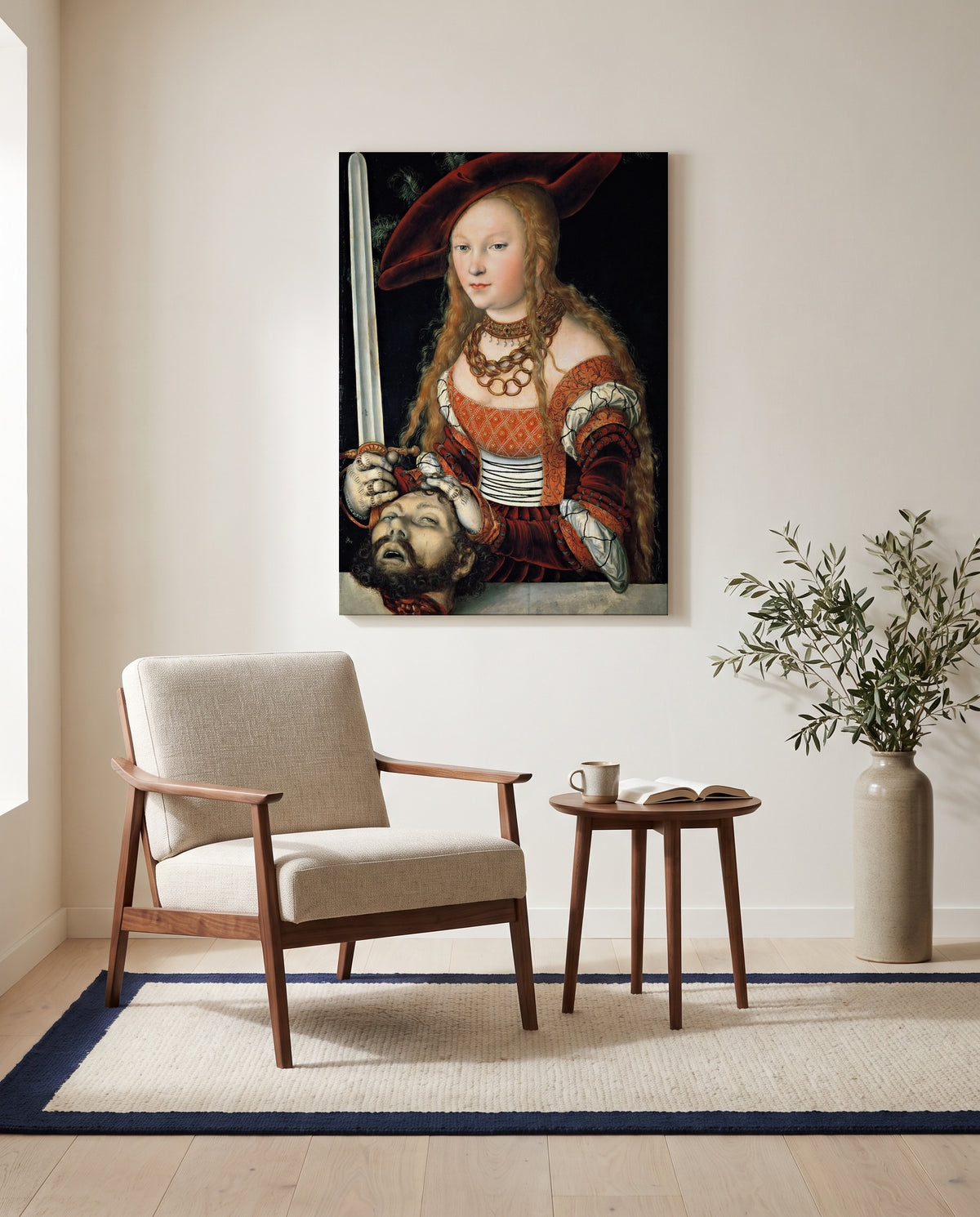 Judith by Lucas Cranach the Elder as a stretched canvas above a linen lounge chair in a reading corner