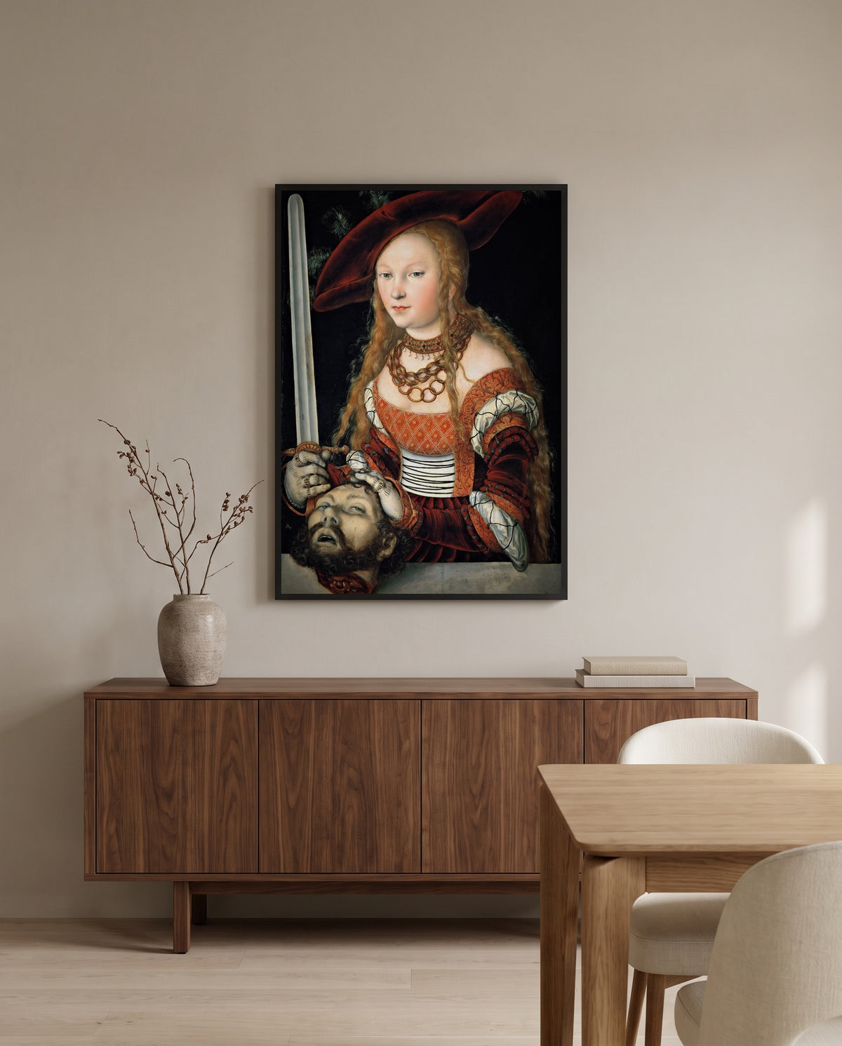 Judith by Lucas Cranach the Elder in a black frame above a walnut sideboard in a dining room