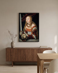Judith by Lucas Cranach the Elder in a black frame above a walnut sideboard in a dining room