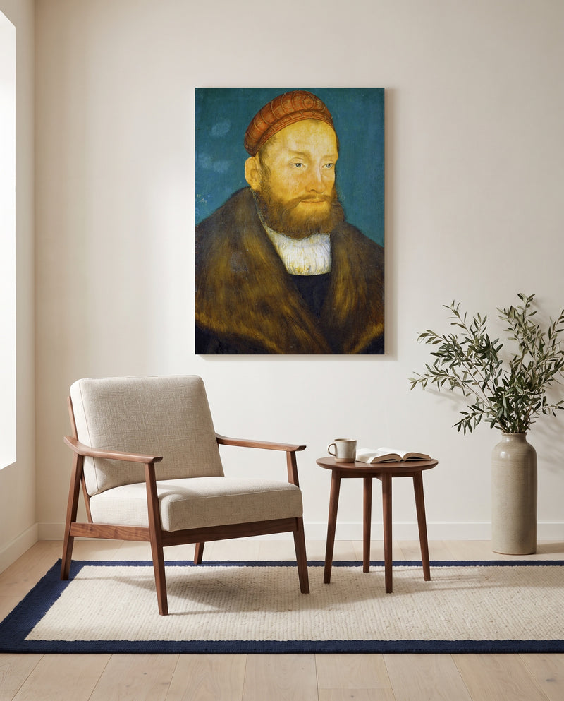 Margrave Casimir by Lucas Cranach the Elder as a stretched canvas above a linen lounge chair in a reading corner