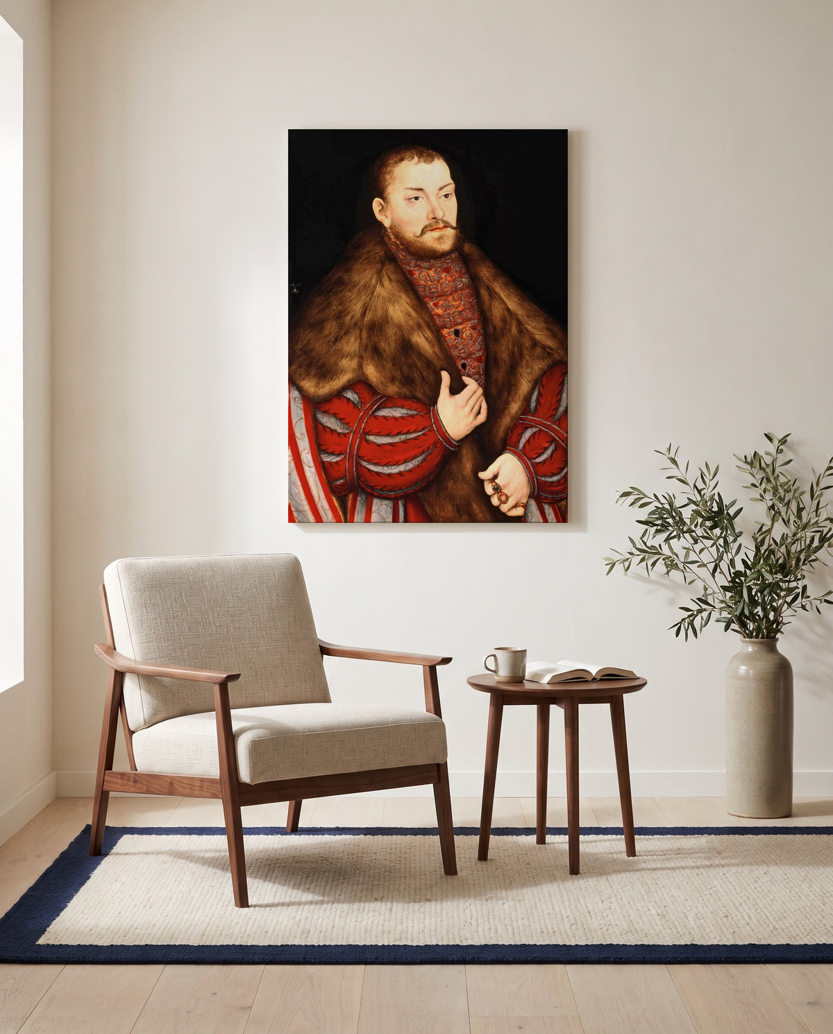 Portrait of Joachim II by Lucas Cranach the Elder as a stretched canvas above a linen lounge chair in a reading corner