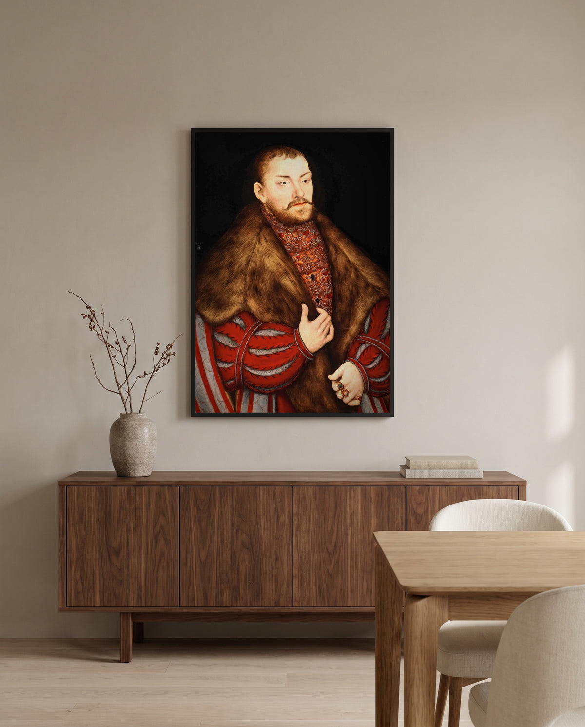 Portrait of Joachim II by Lucas Cranach the Elder in a black frame above a walnut sideboard in a dining room