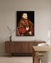 Portrait of Joachim II by Lucas Cranach the Elder in a black frame above a walnut sideboard in a dining room