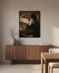 In the Loge by Mary Cassatt in a black frame above a walnut sideboard in a dining room