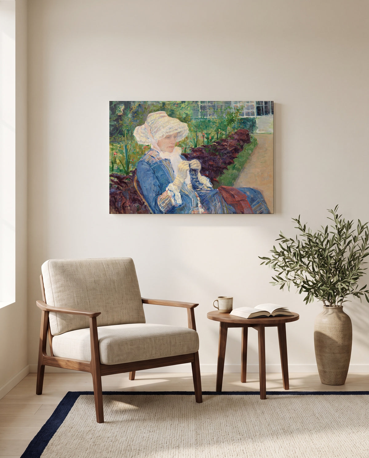 Lydia Crocheting by Mary Cassatt as a stretched canvas above a linen lounge chair in a reading corner