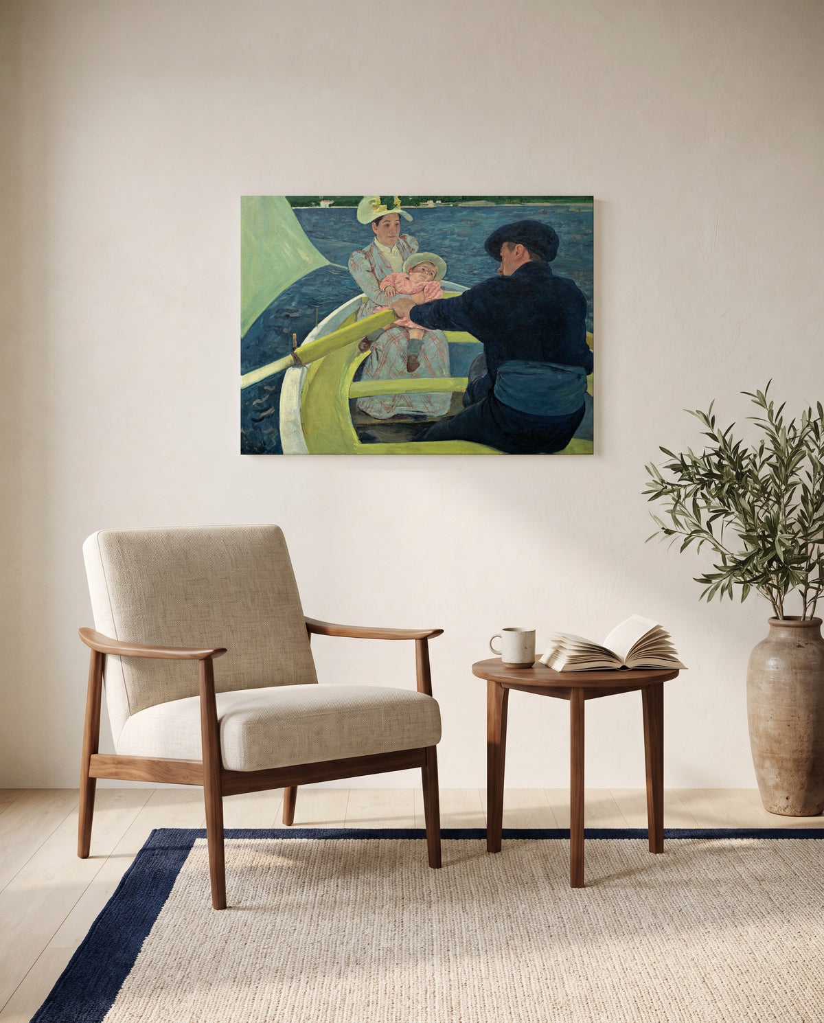 The Boating Party by Mary Cassatt as a stretched canvas above a linen lounge chair in a reading corner