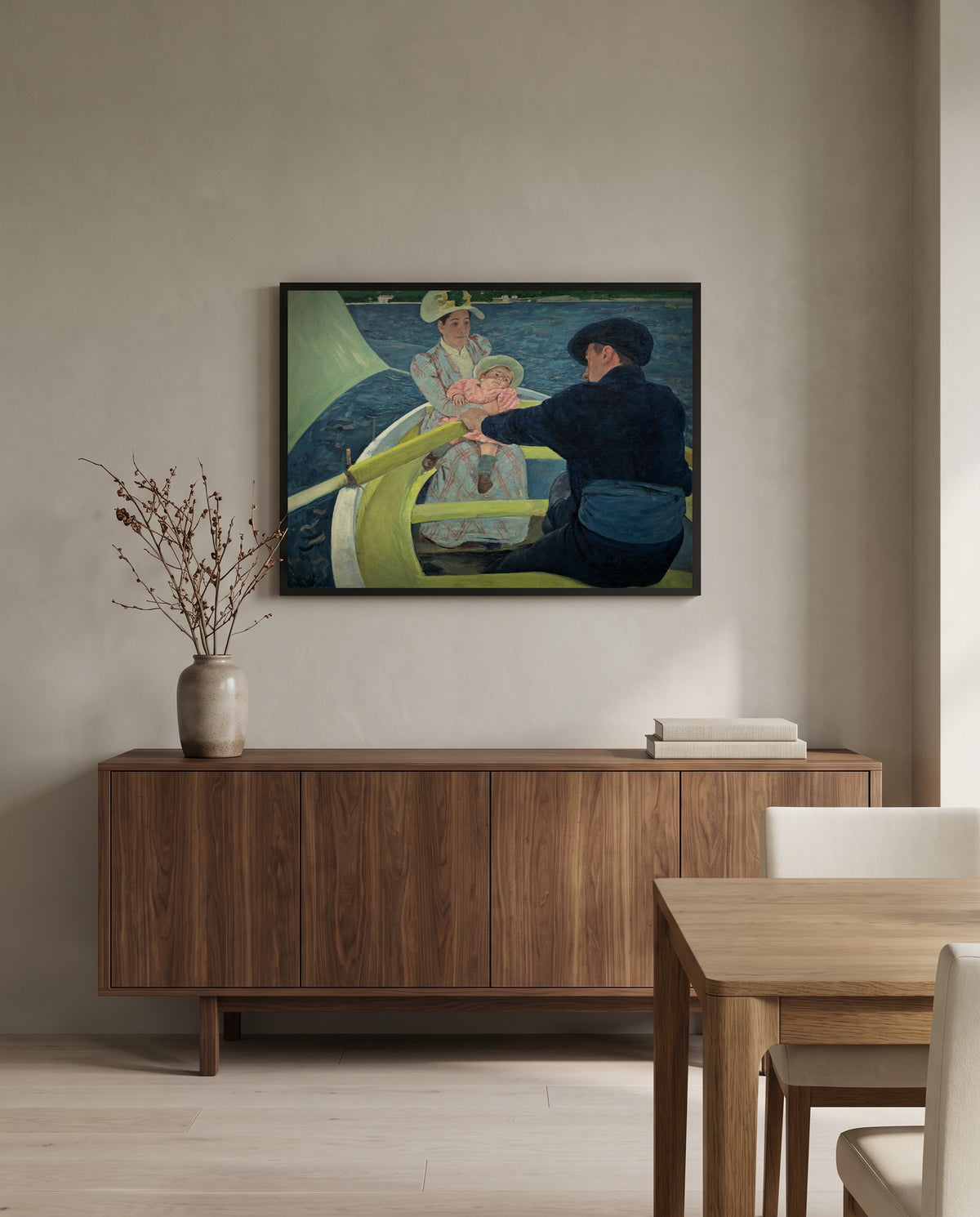 The Boating Party by Mary Cassatt in a black frame above a walnut sideboard in a dining room