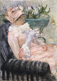 The Cup of Tea by Mary Cassatt: a woman in pink and a bonnet holding a teacup in a striped armchair, white flowers behind