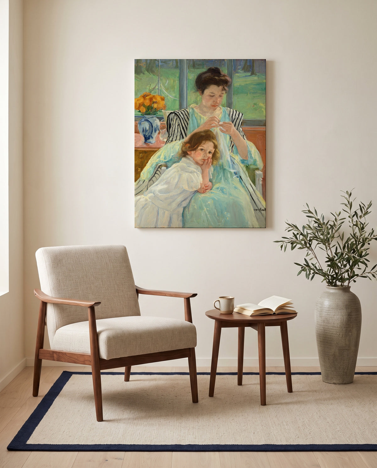 Young Mother Sewing by Mary Cassatt as a stretched canvas above a linen lounge chair in a reading corner
