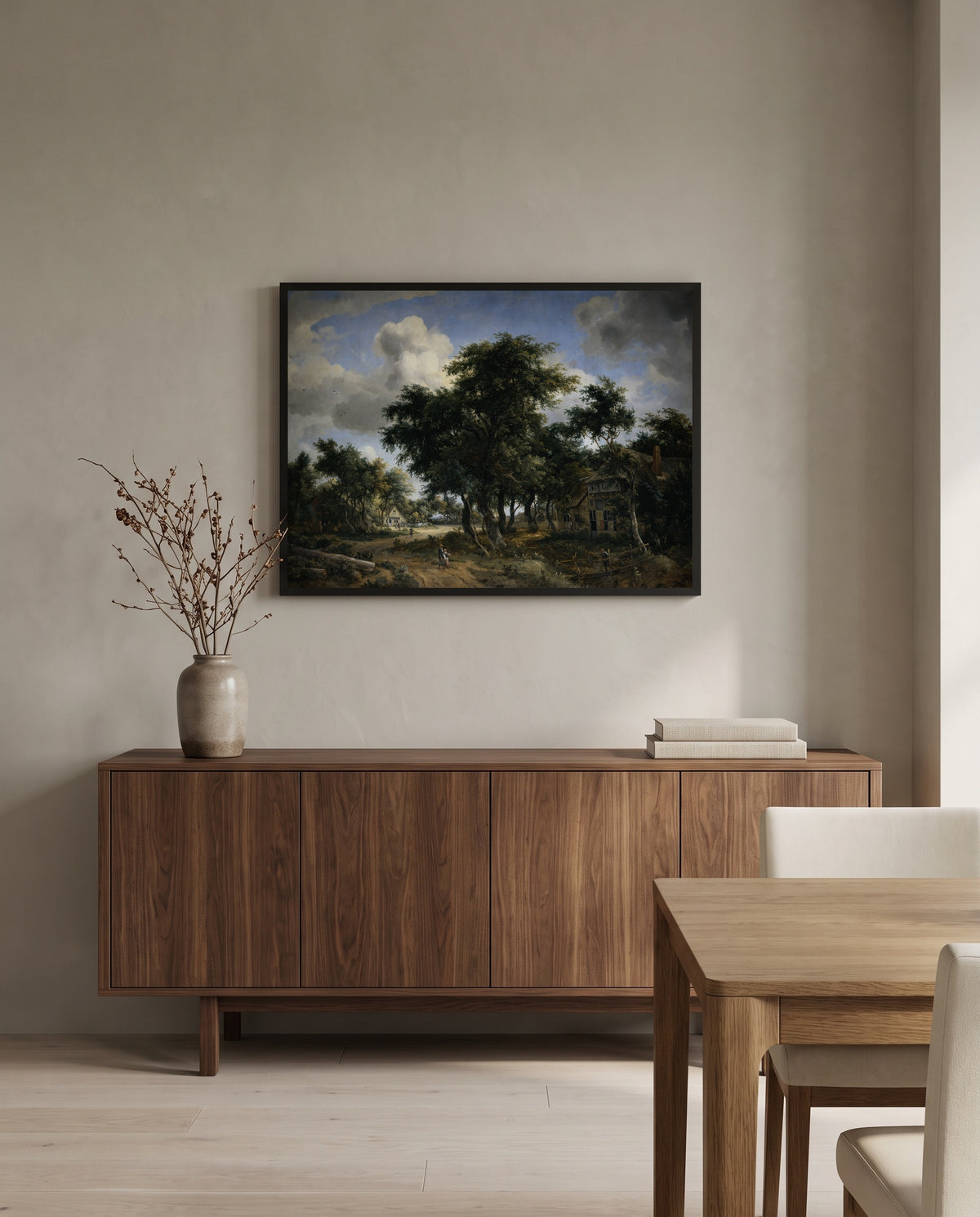 Village Street under Trees by Meindert Hobbema in a black frame above a walnut sideboard in a dining room