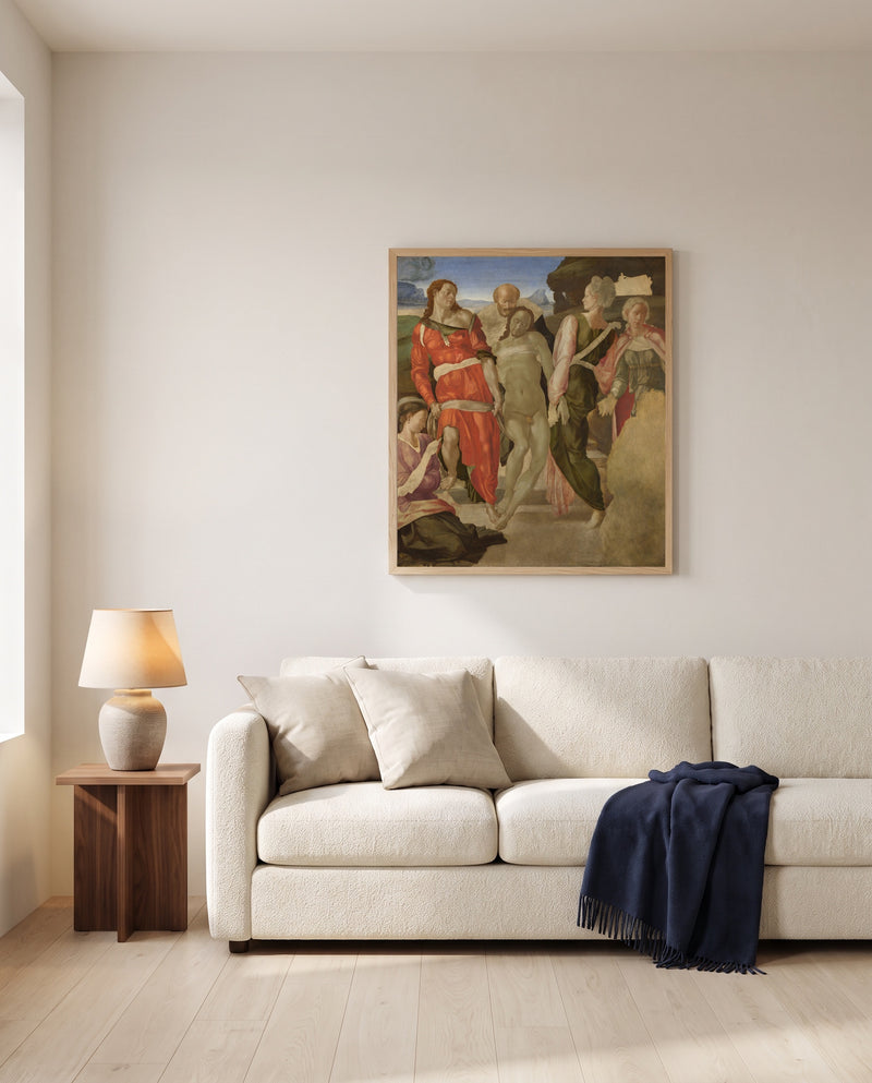 The Entombment by Michelangelo framed in natural oak above a cream sofa in a warm living room