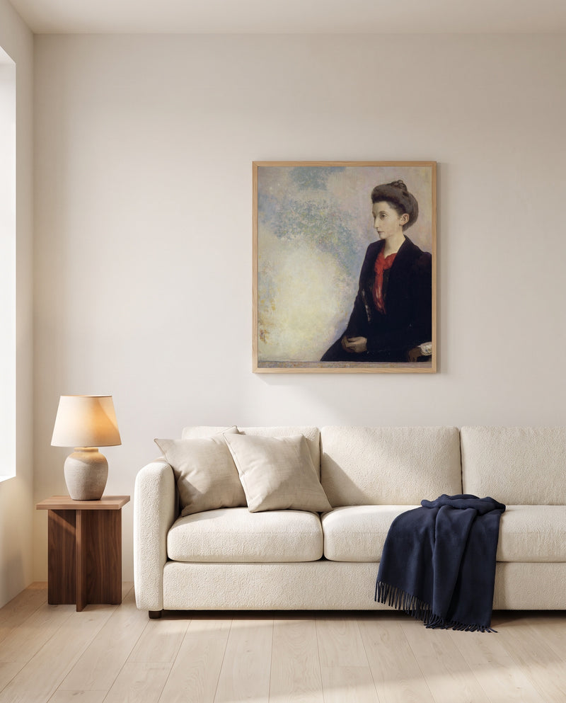 Baroness de Domecy by Odilon Redon framed in natural oak above a cream sofa in a warm living room