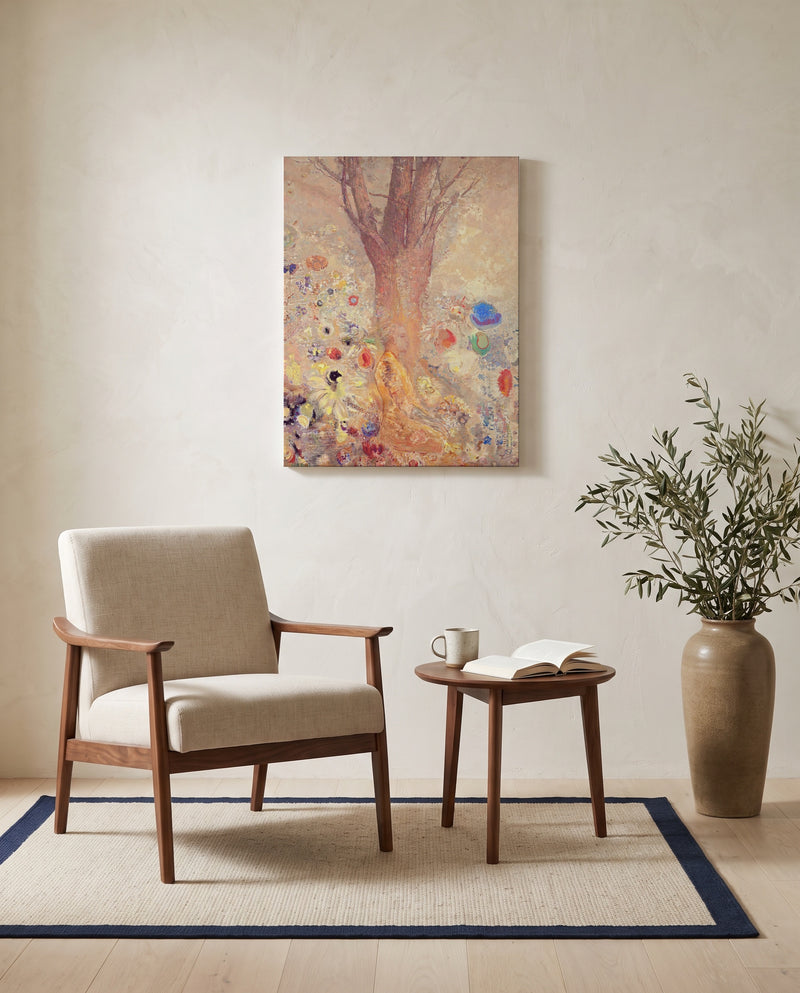 Buddha by Odilon Redon as a stretched canvas above a linen lounge chair in a reading corner