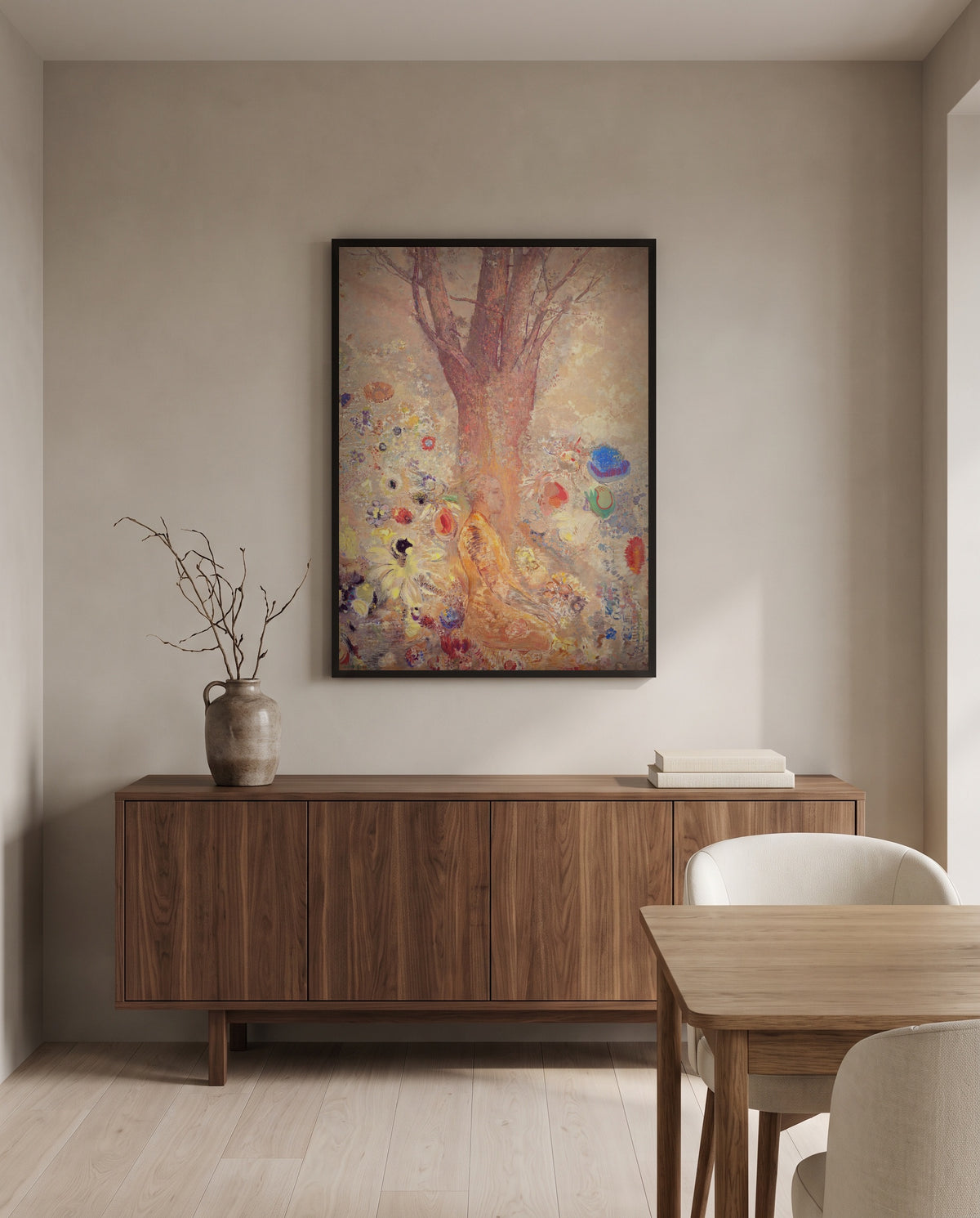 Buddha by Odilon Redon in a black frame above a walnut sideboard in a dining room