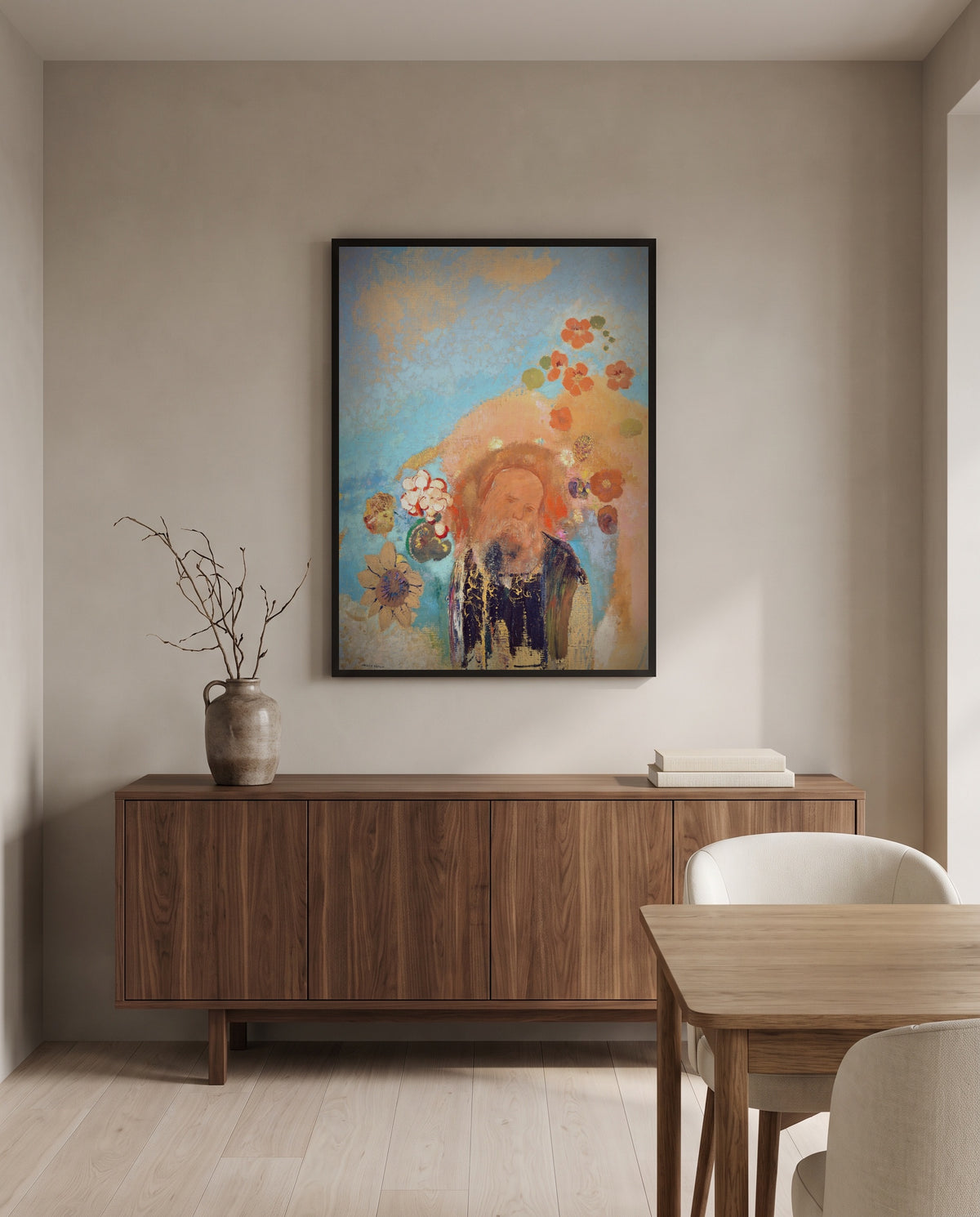 Evocation of Roussel by Odilon Redon in a black frame above a walnut sideboard in a dining room
