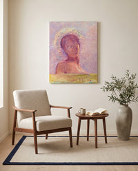 In Heaven by Odilon Redon as a stretched canvas above a linen lounge chair in a reading corner