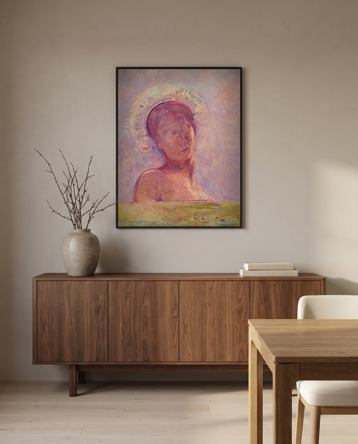 In Heaven by Odilon Redon in a black frame above a walnut sideboard in a dining room