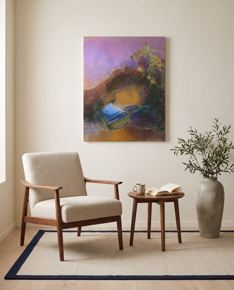 Orpheus by Odilon Redon as a stretched canvas above a linen lounge chair in a reading corner