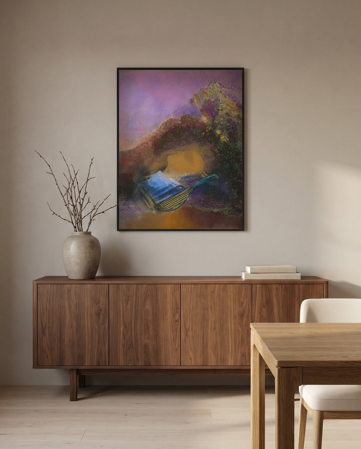 Orpheus by Odilon Redon in a black frame above a walnut sideboard in a dining room