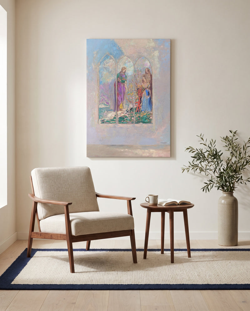 Piety beside a Red Tree by Odilon Redon as a stretched canvas above a linen lounge chair in a reading corner