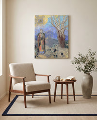 The Buddha by Odilon Redon as a stretched canvas above a linen lounge chair in a reading corner