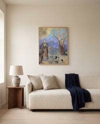 The Buddha by Odilon Redon framed in natural oak above a cream sofa in a warm living room