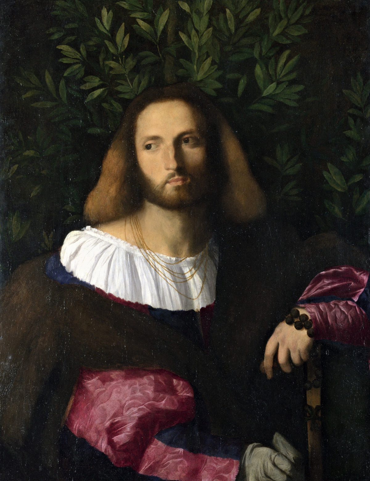 Portrait of a Poet by Palma Vecchio: a bearded young man in maroon and fur before dark green laurel leaves