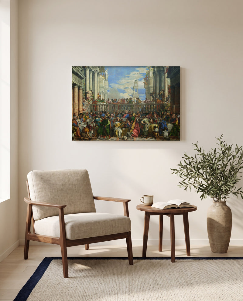 The Wedding at Cana by Paolo Veronese as a stretched canvas above a linen lounge chair in a reading corner