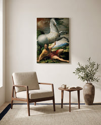 Conversion of Saint Paul by Parmigianino as a stretched canvas above a linen lounge chair in a reading corner