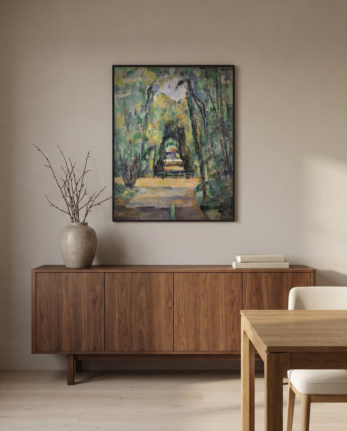 Avenue at Chantilly by Paul Cézanne in a black frame above a walnut sideboard in a dining room