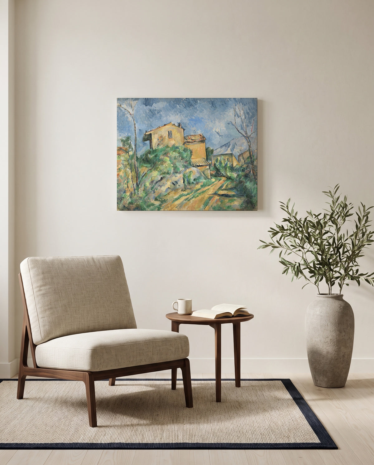 Maison Maria by Paul Cézanne as a stretched canvas above a linen lounge chair in a reading corner