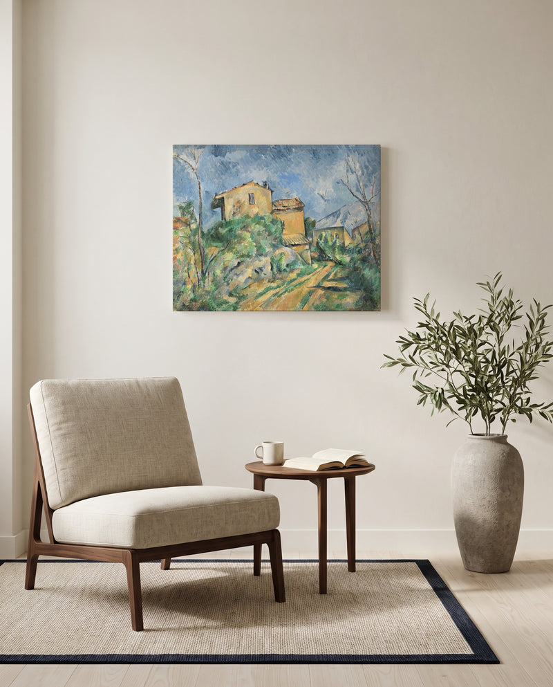 Maison Maria by Paul Cézanne as a stretched canvas above a linen lounge chair in a reading corner